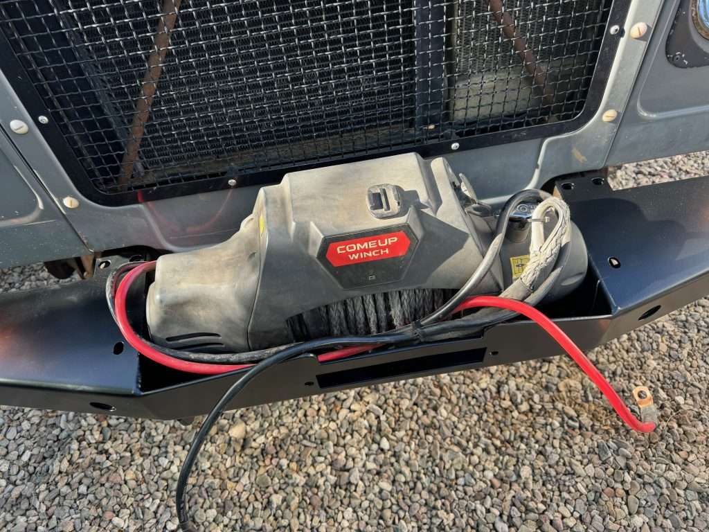Almost a perfect fit, but the symmetrical COMEUP Winch needs a centered footprint and fairlead opening for this to work. The footprint and opening on this bumper are offset about an inch to the right for a different winch style.