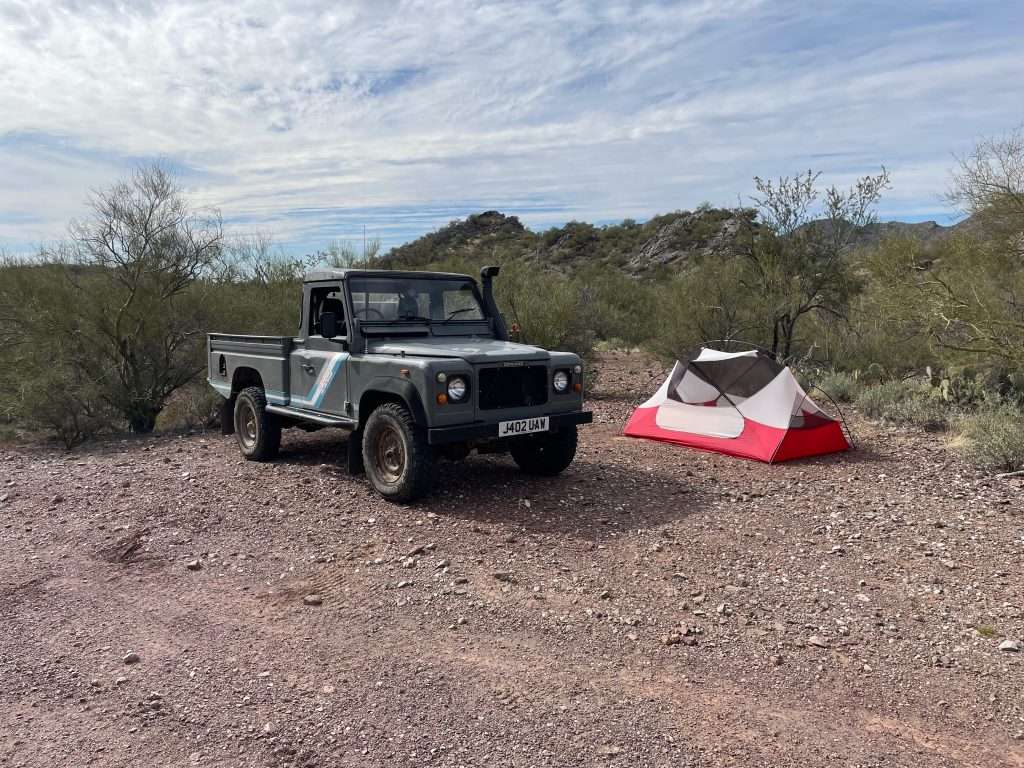Out tent camping in the desert with the Land Rover Defender 110 Hi-Cap