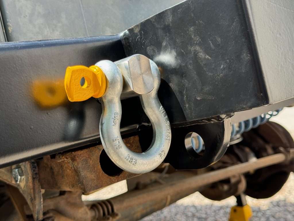 The swivel shackle installed on the Rovers North Defender winch bumper