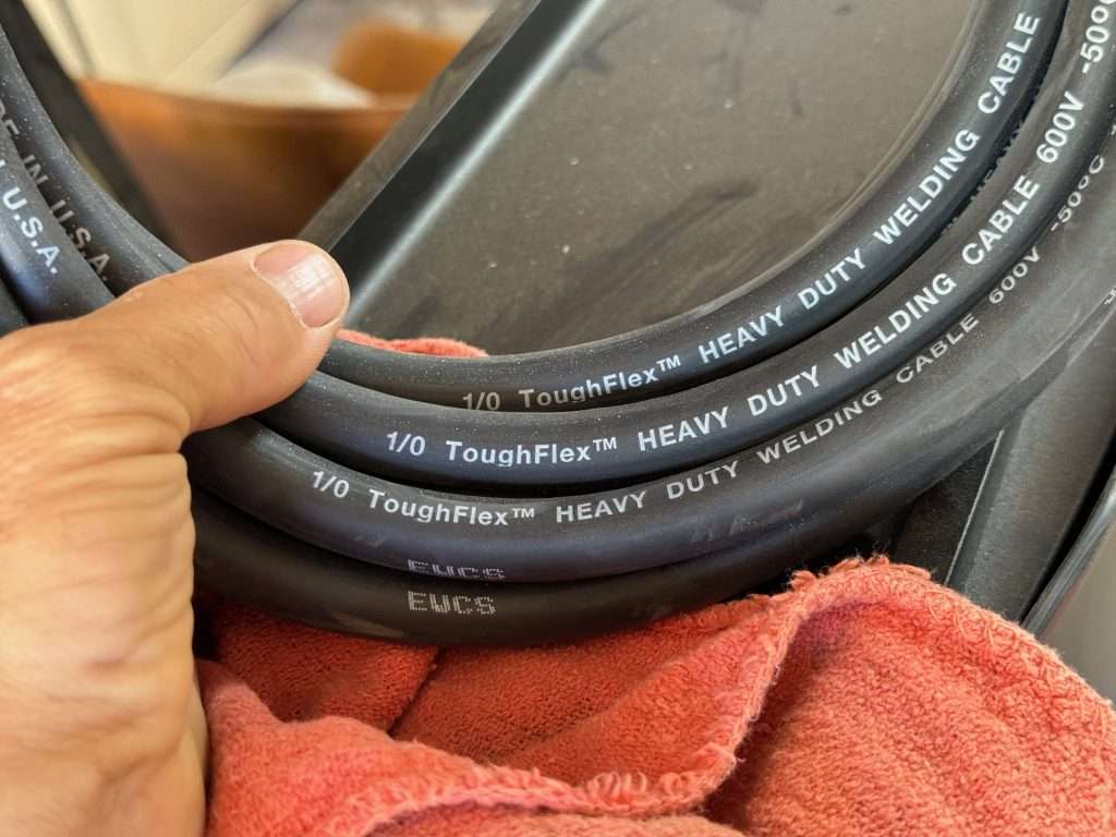 Found this 1/0 welding cable on Amazon. A good bit beefier than the 2 gauge but still nice and flexible and should be easy to work with.