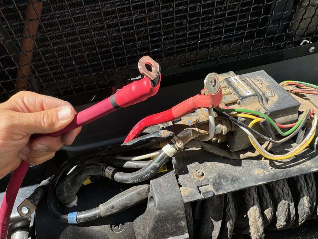 The positive cable ring terminal at a winch had a good 90 degree bend in it, so I replicated with my new cable.