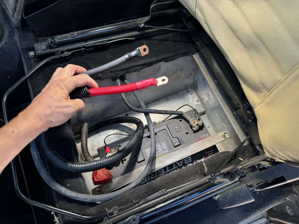 Once the cables are routed, the hard part is over and all that's left is to connect them to the battery terminals.