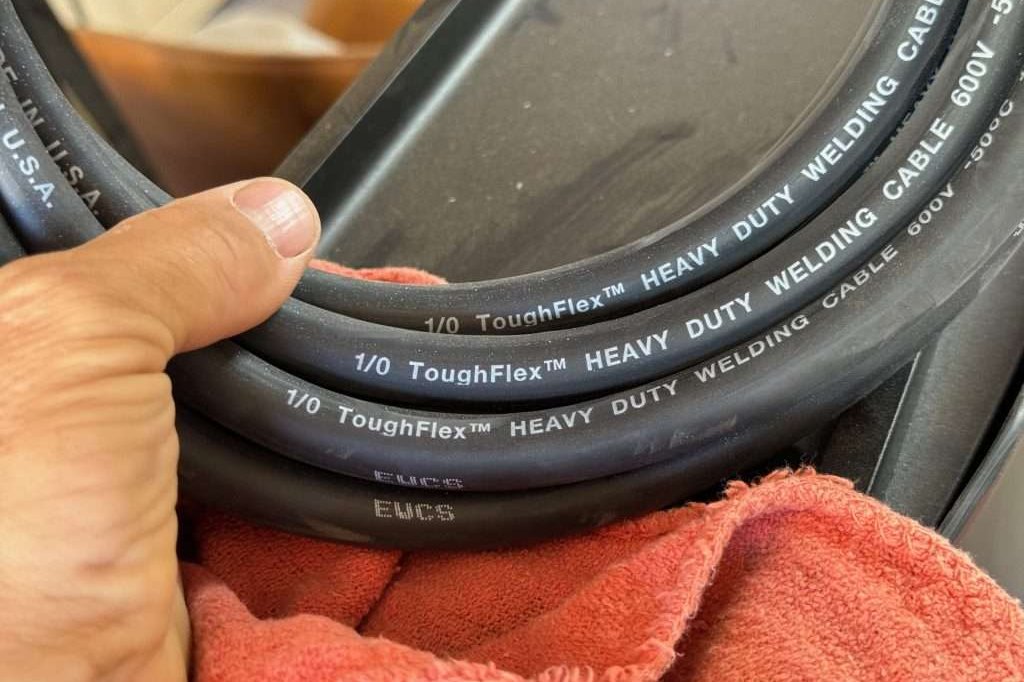 Found this 1/0 welding cable on Amazon. A good bit beefier than the 2 gauge but still nice and flexible and should be easy to work with.