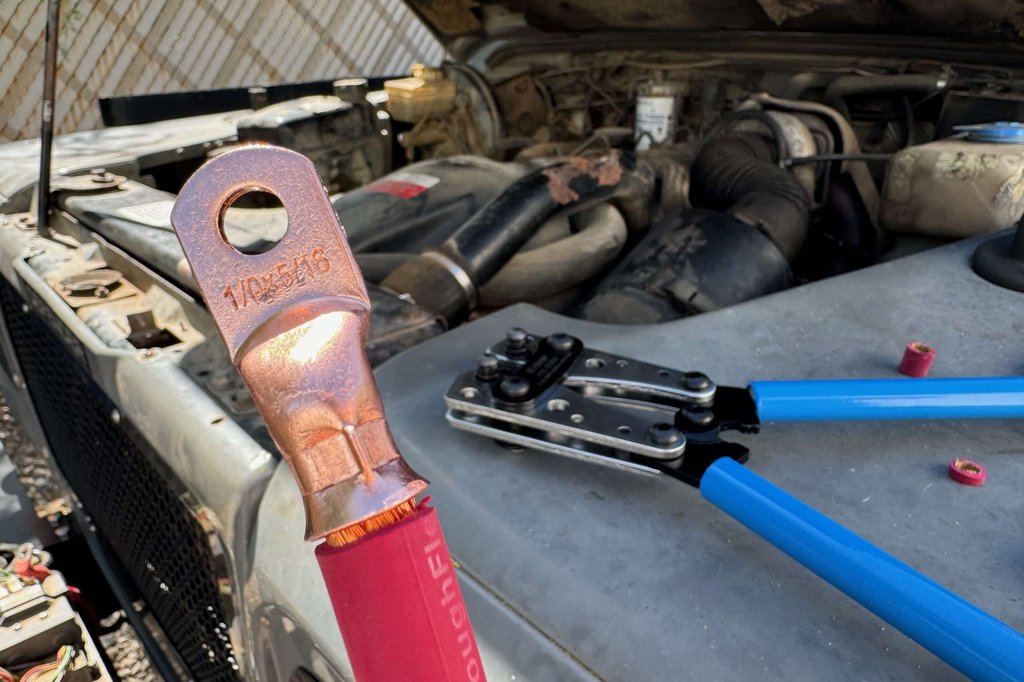 The inexpensive crimper from Amazon did a good job. This ring terminal isn't going anywhere.