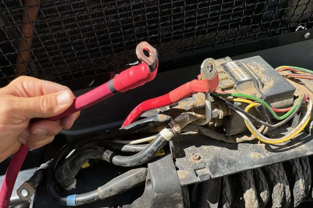 The positive cable ring terminal at a winch had a good 90 degree bend in it, so I replicated with my new cable.