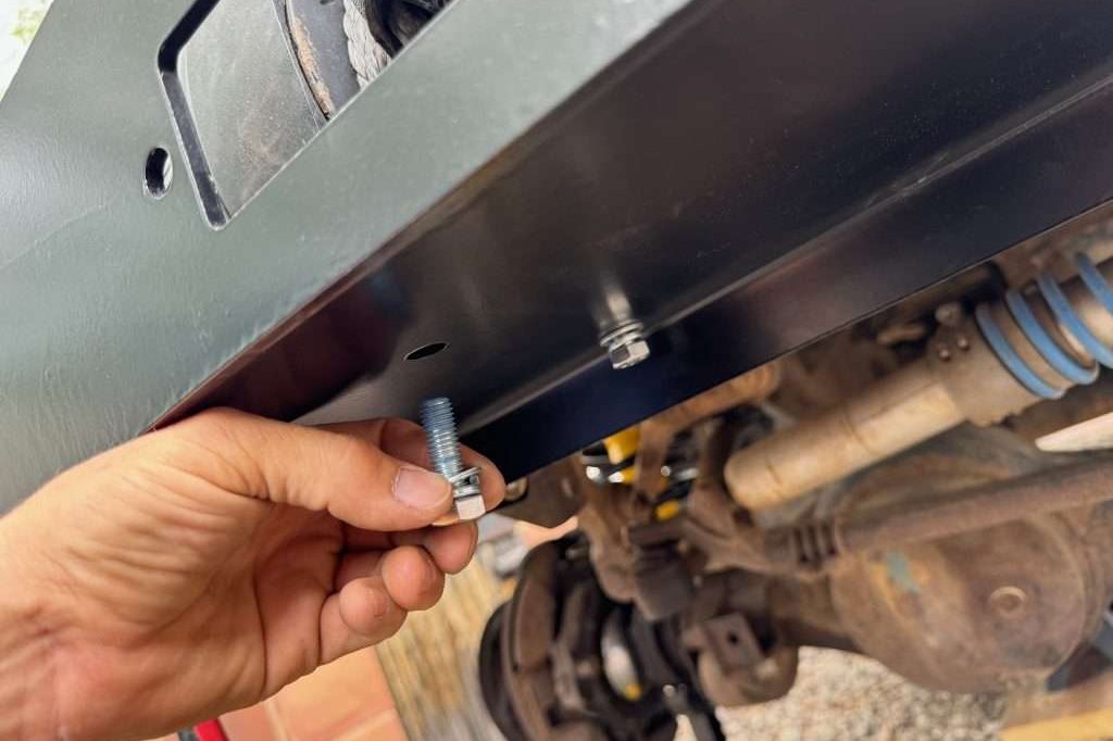 Since the winch seat nuts are held in place with permatex gasket maker, the bolts should thread very easily without much hunting or fussing