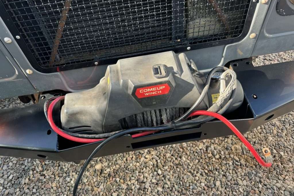 Almost a perfect fit, but the symmetrical COMEUP Winch needs a centered footprint and fairlead opening for this to work. The footprint and opening on this bumper are offset about an inch to the right for a different winch style.
